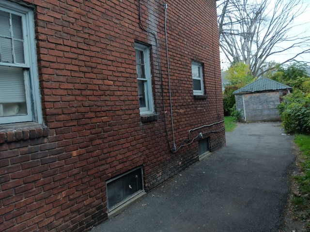 view of side of home with a patio