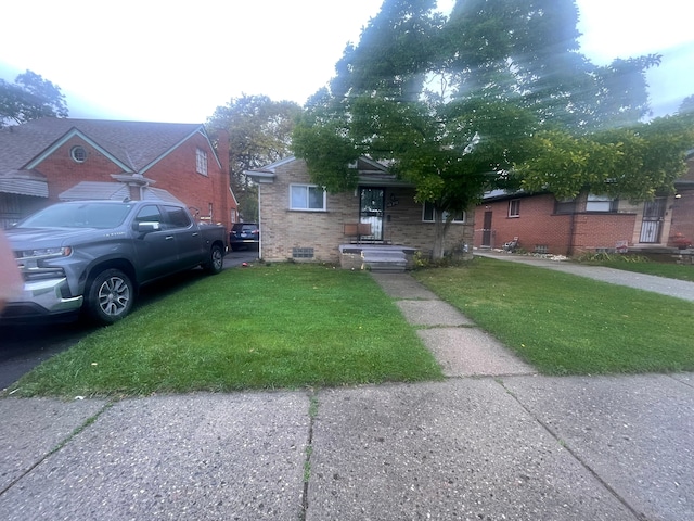 view of front of home with a front yard