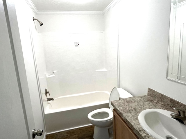 full bathroom featuring shower / bathing tub combination, hardwood / wood-style flooring, toilet, and crown molding