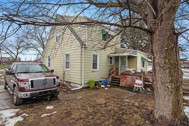 6000 N Dort Hwy, Flint, MI 48505 - view of side of property featuring roof with shingles