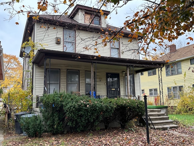 view of front of property featuring covered porch