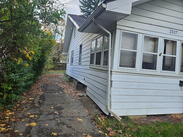 view of property exterior with cooling unit