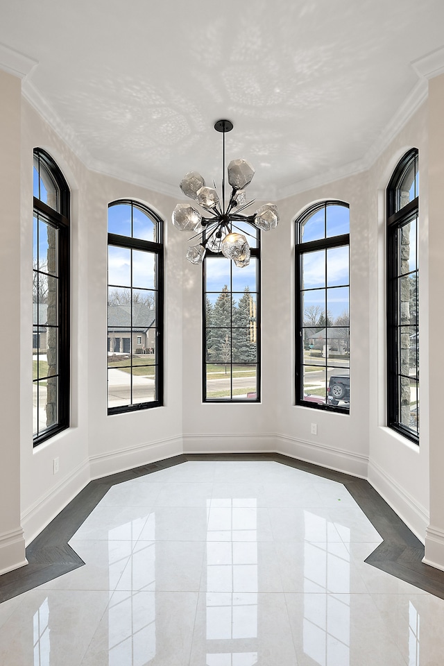 unfurnished dining area featuring crown molding, a notable chandelier, and light tile patterned flooring