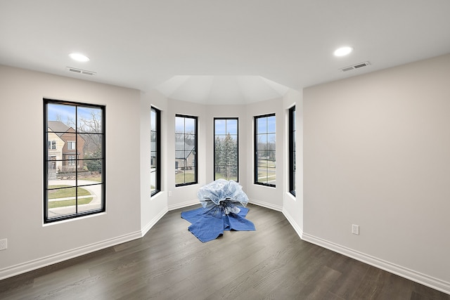 interior space with dark hardwood / wood-style flooring