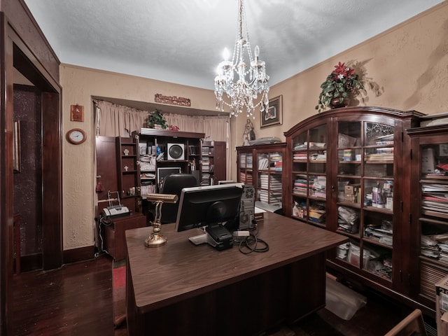 office featuring dark hardwood / wood-style flooring and an inviting chandelier