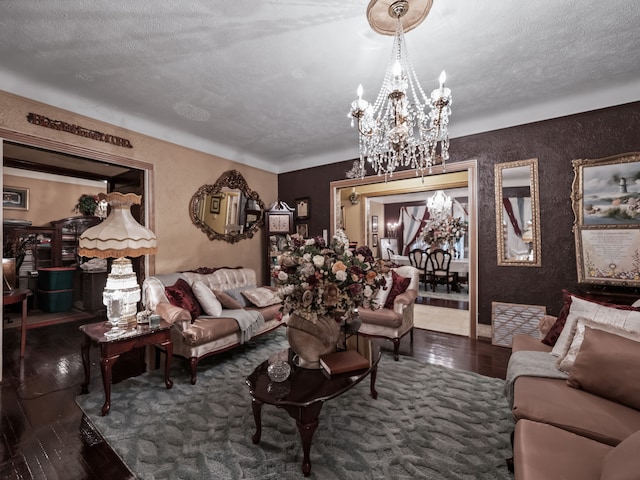 living room featuring a textured ceiling and a chandelier