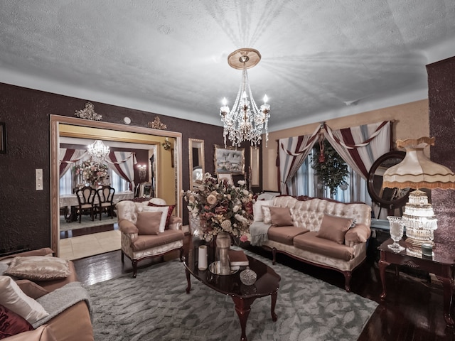 tiled living room with a textured ceiling and a chandelier