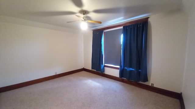 2540 S Dreyer Rd, Au Gres, MI 48703 - carpeted spare room featuring a ceiling fan and baseboards