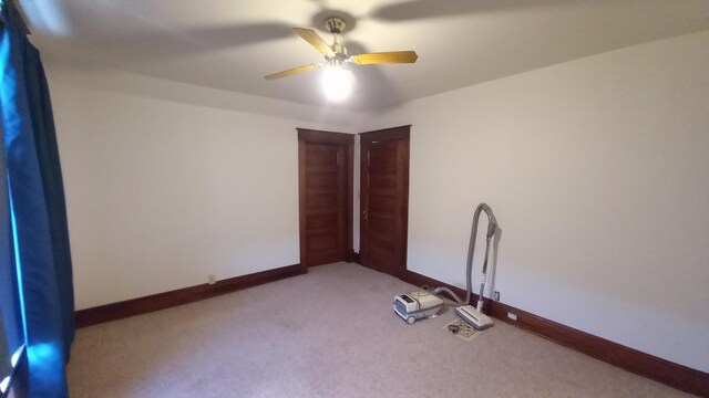 2540 S Dreyer Rd, Au Gres, MI 48703 - unfurnished room with ceiling fan, carpet floors, and baseboards