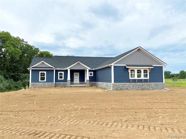 view of front of property featuring stone siding