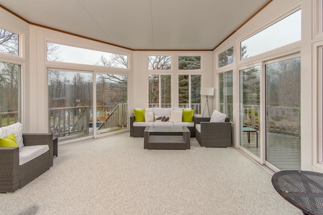 4090 Perryville Rd, Ortonville, MI 48462 - sunroom with carpet floors, an outdoor living space, healthy amount of natural light, and expansive windows