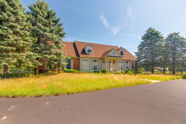 view of cape cod-style house