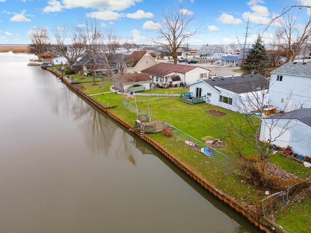 drone / aerial view with a water view