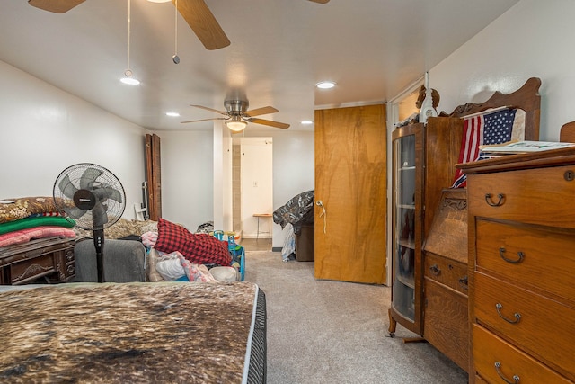 carpeted bedroom with ceiling fan