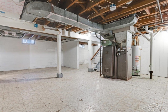 basement featuring gas water heater