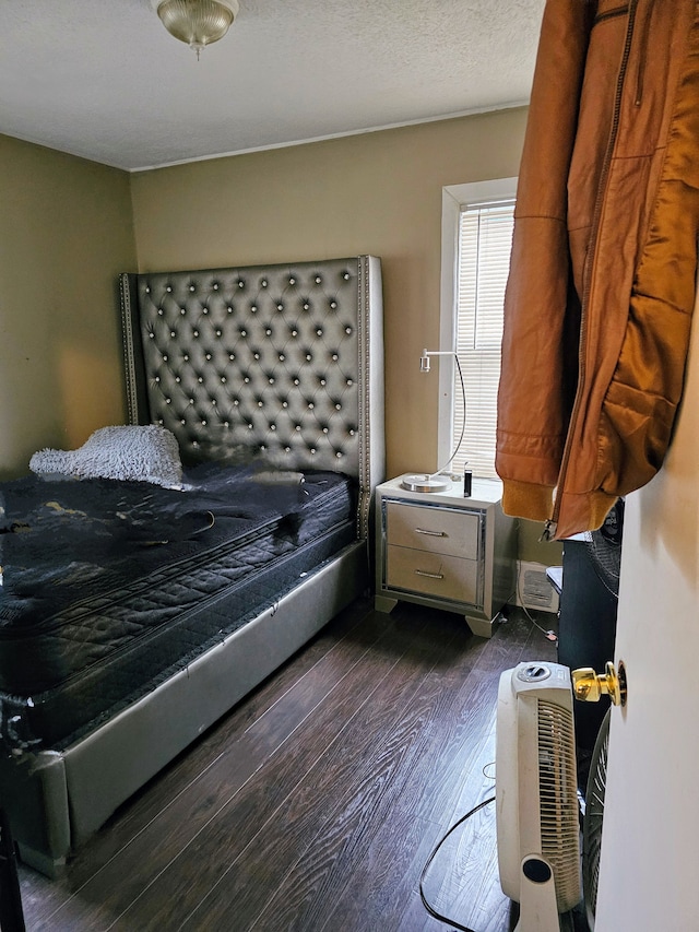 19356 Huntington Rd, Detroit, MI 48219 - bedroom with dark wood-style floors