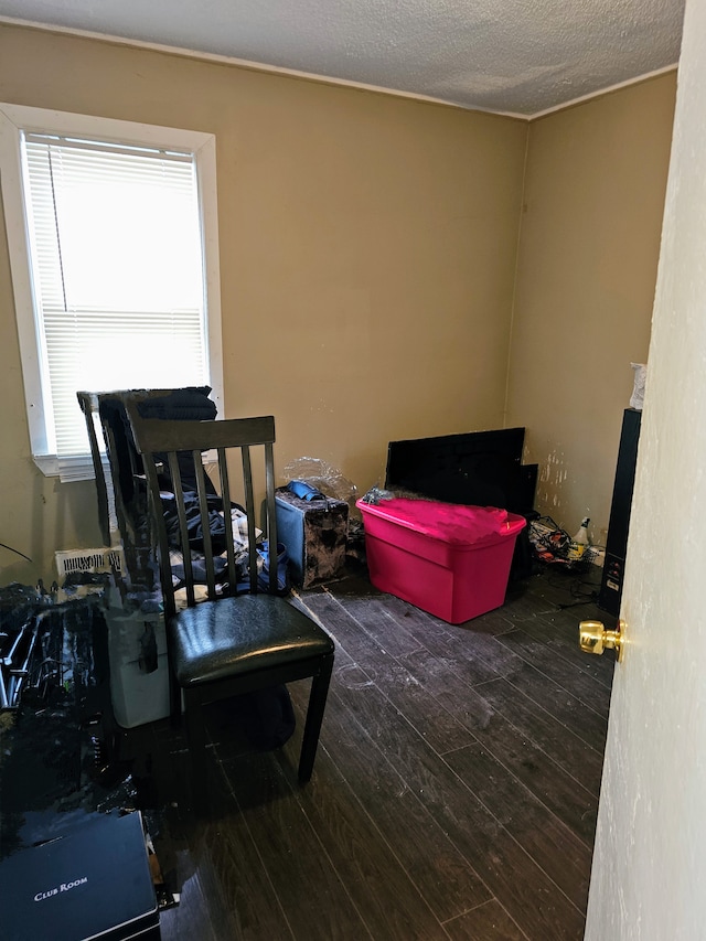 19356 Huntington Rd, Detroit, MI 48219 - recreation room featuring hardwood / wood-style flooring and a textured ceiling
