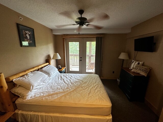 5900 Water Rd Unit 313, Rothbury, MI 49452 - bedroom featuring french doors, access to outside, a textured ceiling, dark carpet, and a ceiling fan