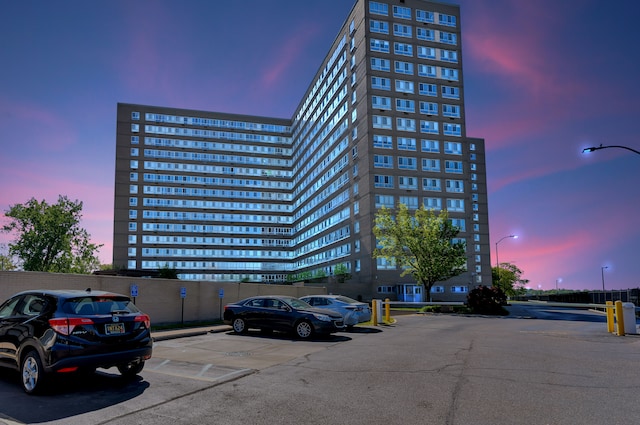 view of outdoor building at dusk