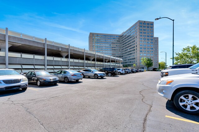8900 E Jefferson Ave Unit 630-631, Detroit, MI 48214 - view of uncovered parking lot