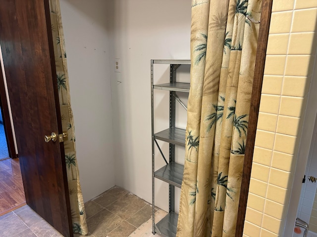 bathroom featuring wood-type flooring