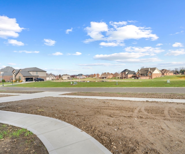 view of yard featuring a residential view