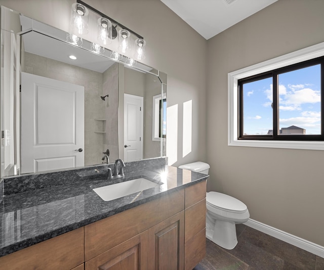 full bath with baseboards, a shower, toilet, tile patterned flooring, and vanity