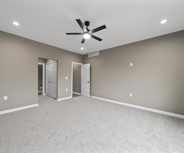 spare room featuring recessed lighting, visible vents, ceiling fan, and baseboards