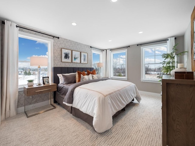 bedroom featuring light carpet