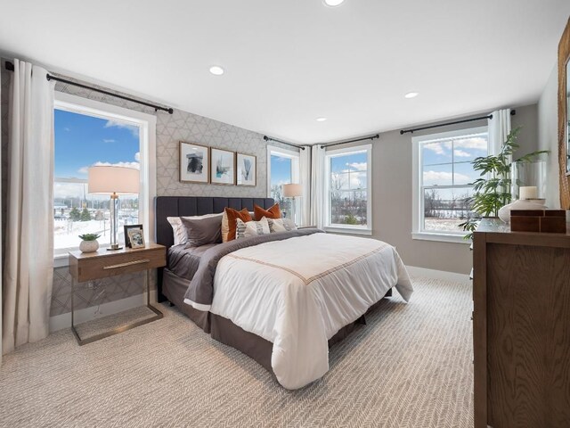 7889 Arimoore Dr, West Bloomfield, MI 48322 - carpeted bedroom featuring baseboards, multiple windows, recessed lighting, an accent wall, and wallpapered walls