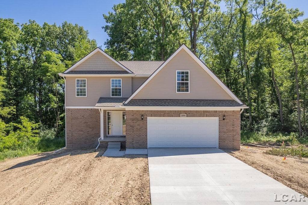 front facade with a garage