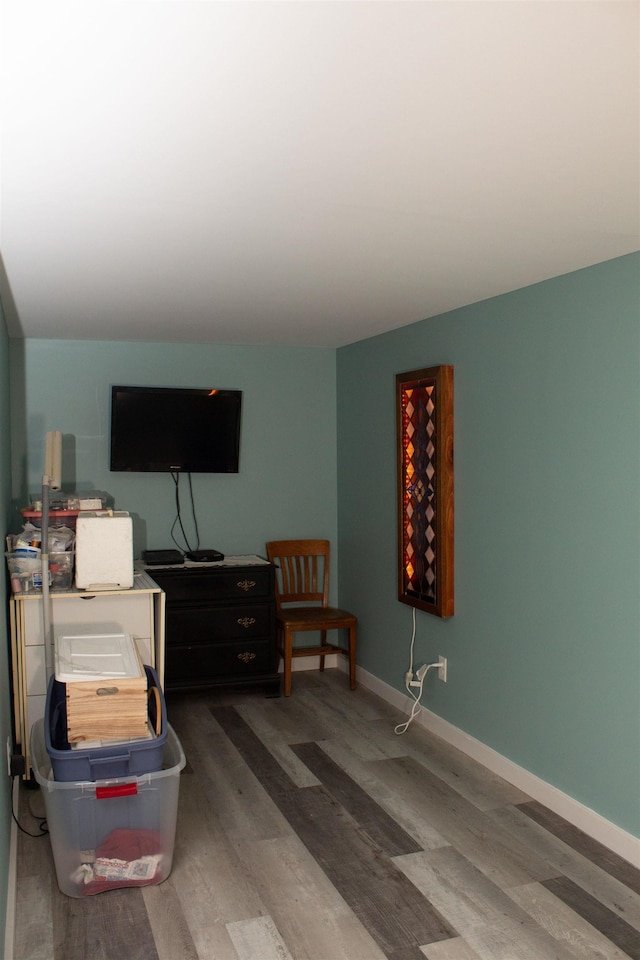 122 Park Ave, Frankfort, MI 49635 - living room featuring wood finished floors and baseboards