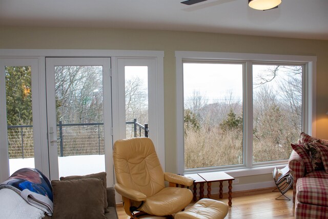 122 Park Ave, Frankfort, MI 49635 - sitting room with wood finished floors and plenty of natural light