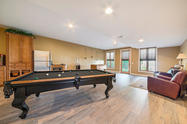 game room featuring light hardwood / wood-style floors and billiards