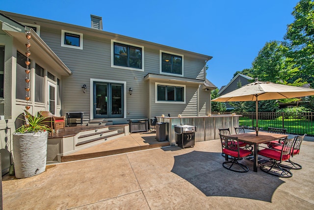 back of house with a patio area