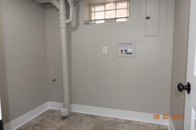 laundry area featuring hookup for a washing machine and electric panel