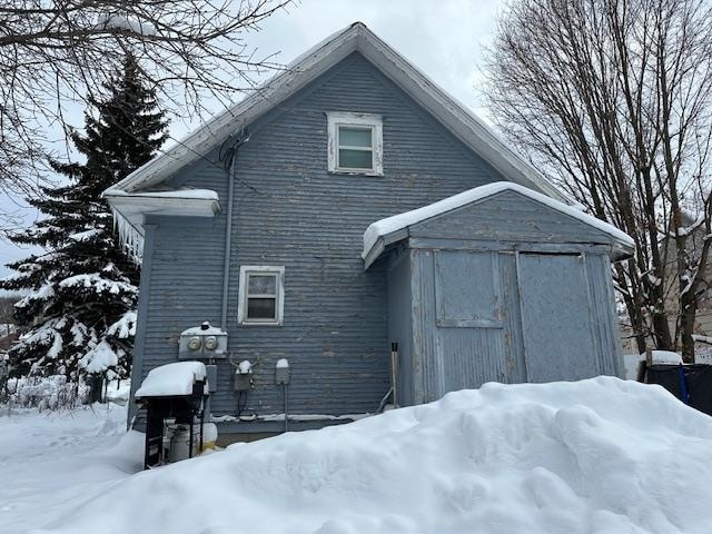 view of snow covered property