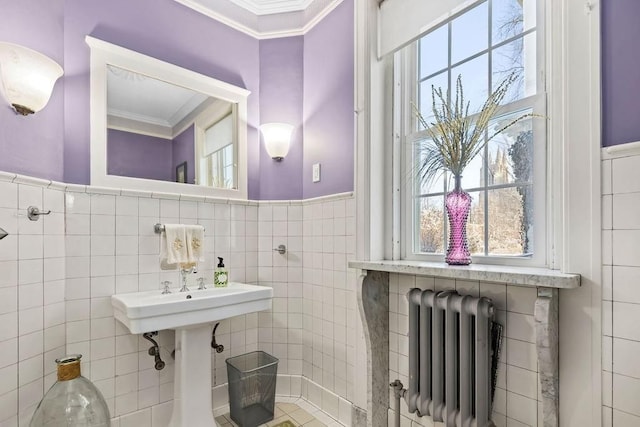 70 W Boston Blvd, Detroit, MI 48202 - bathroom featuring radiator, crown molding, wainscoting, and tile walls