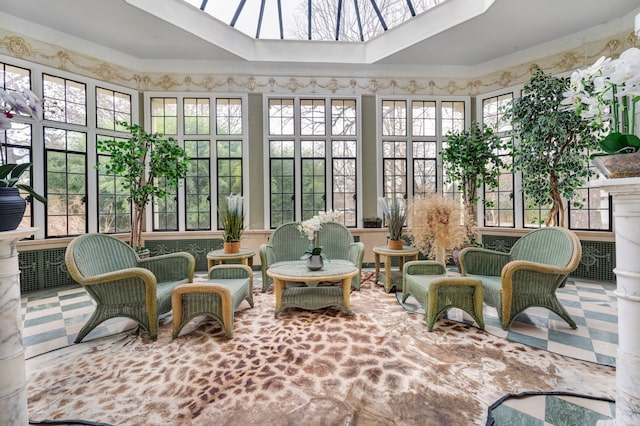 sunroom with a skylight and a wealth of natural light