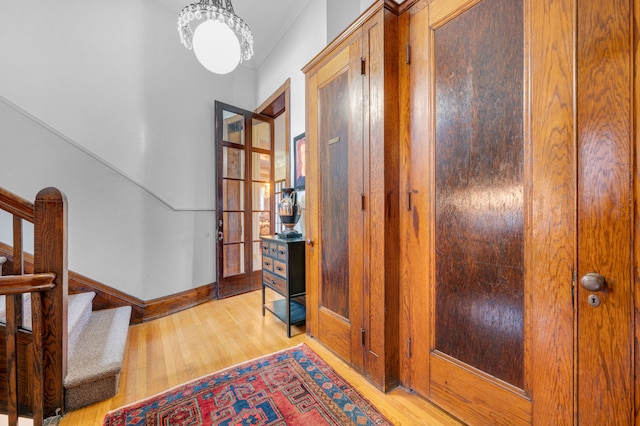 70 W Boston Blvd, Detroit, MI 48202 - foyer entrance featuring light wood-style flooring and stairway