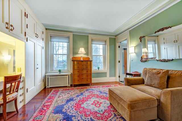 70 W Boston Blvd, Detroit, MI 48202 - living room featuring radiator heating unit, ornamental molding, and dark wood-type flooring
