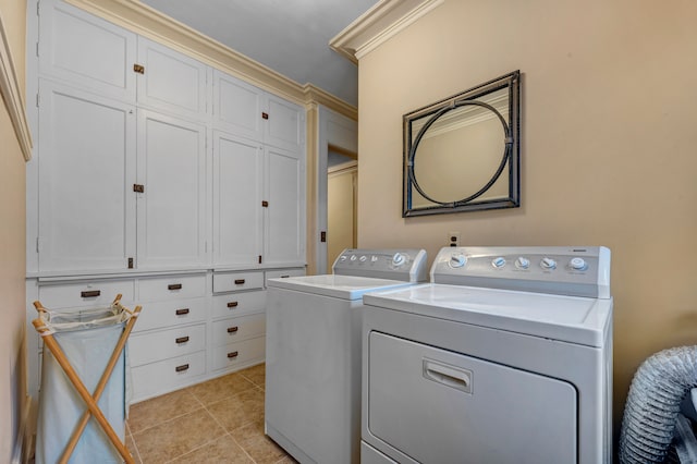 70 W Boston Blvd, Detroit, MI 48202 - washroom with cabinet space, washer and clothes dryer, crown molding, and light tile patterned floors