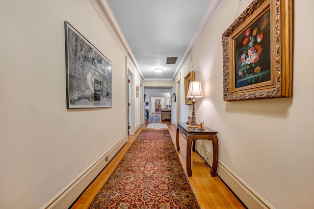 70 W Boston Blvd, Detroit, MI 48202 - hall with light wood-style floors and crown molding