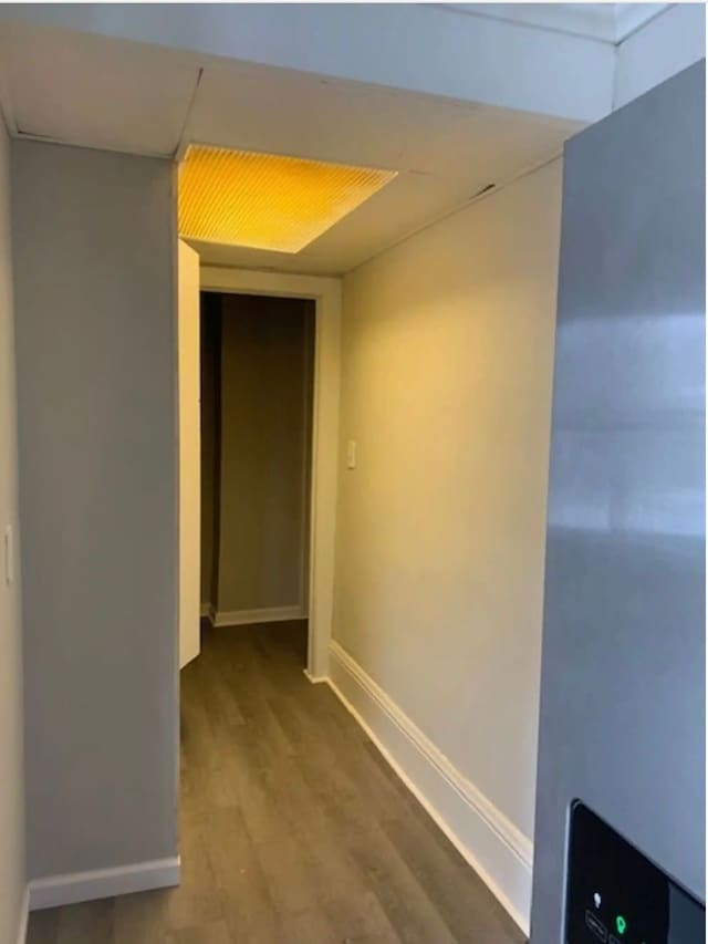 121 S Court St, Howell, MI 48843 - hall featuring wood finished floors and baseboards