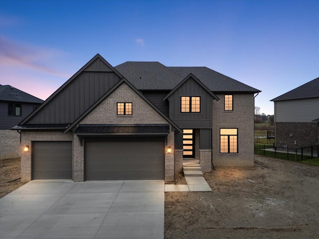 view of front of home with a garage