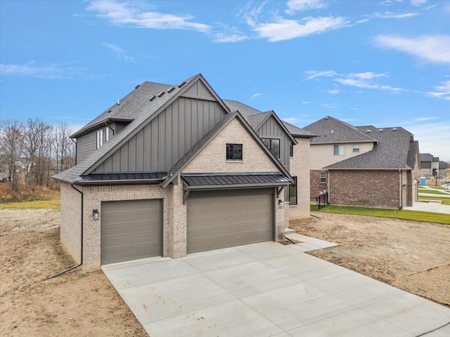 view of front of property featuring a garage