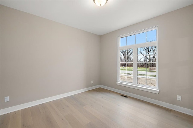 empty room featuring light hardwood / wood-style flooring