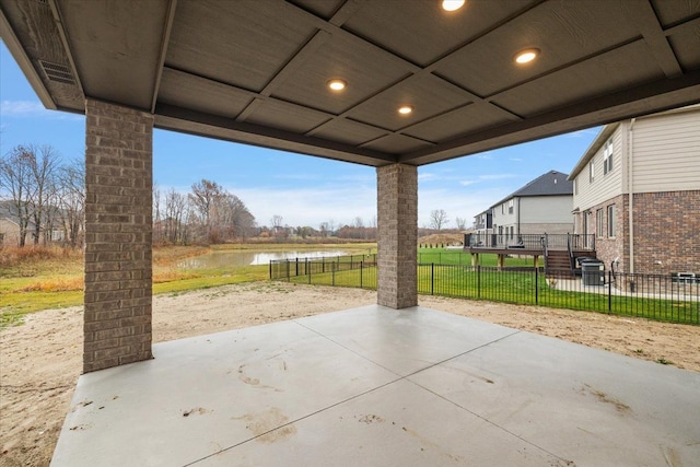 view of patio / terrace featuring a water view