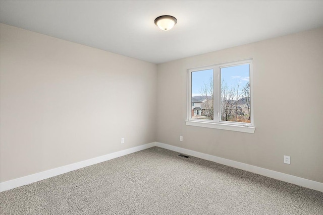 empty room featuring carpet