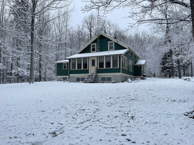 view of snow covered house